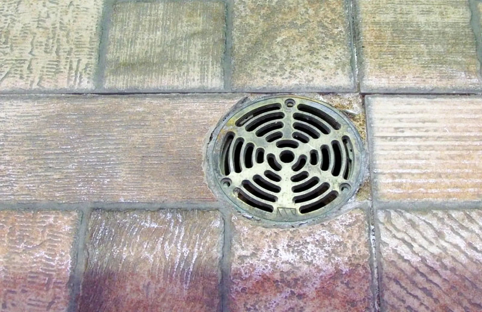 Drainage grate for Oklahoma City backyard patio